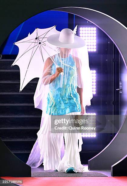 Naomi Osaka of Japan walks out ahead of the Women's Singles First Round match against Antonia Ruzic of Croatia on day three of the 2026 Australian...