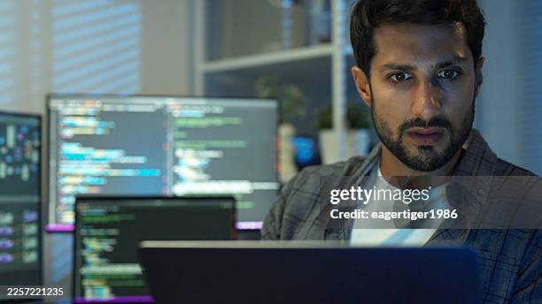 latin american programmer debugging complex ai code late at night. - python code stock pictures, royalty-free photos & images