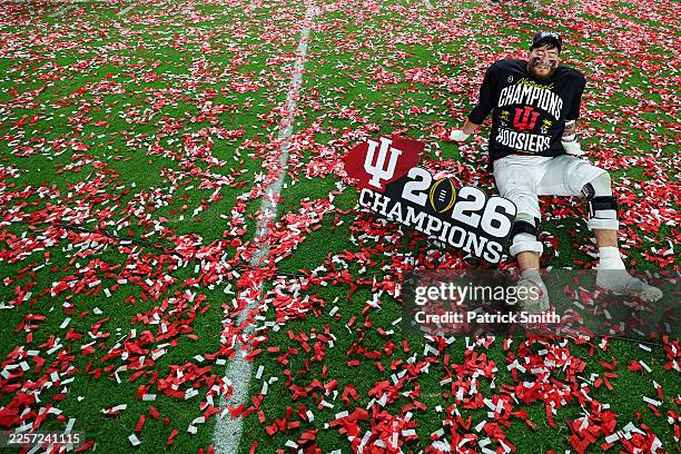 Zen Michalski of the Indiana Hoosiers sits among confetti on the field after defeating the Miami Hurricanes in the 2026 College Football Playoff...