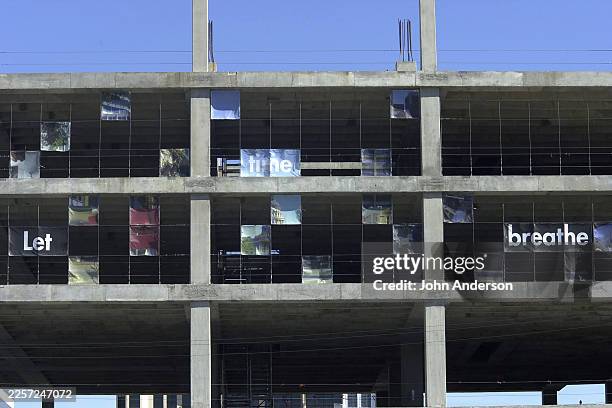 Partial view of the 'Take Time' art instillation exhibited on the unfinished Intel building , Austin, Texas, February 25, 2002. The instillation was...