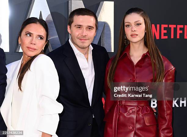Victoria Beckham, Brooklyn Beckham and Nicola Peltz attend the Netflix 'Beckham' UK Premiere at The Curzon Mayfair on October 03, 2023 in London,...
