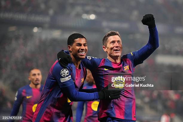 Robert Lewandowski of FC Barcelona celebrates scoring his team's fourth goal with teammate Marcus Rashford during the UEFA Champions League 2025/26...