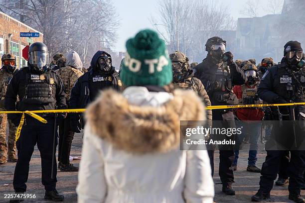 Protesters clash with law enforcement after a federal agent shot and killed a man on Jan. 24 â" the second federal-involved shooting in the city this...