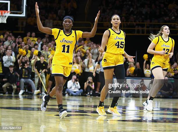 Guard Chazadi "Chit-Chat" Wright of the Iowa Hawkeyes celebrates after a 3-point basket in the first half against the Ohio State Buckeyes on January...