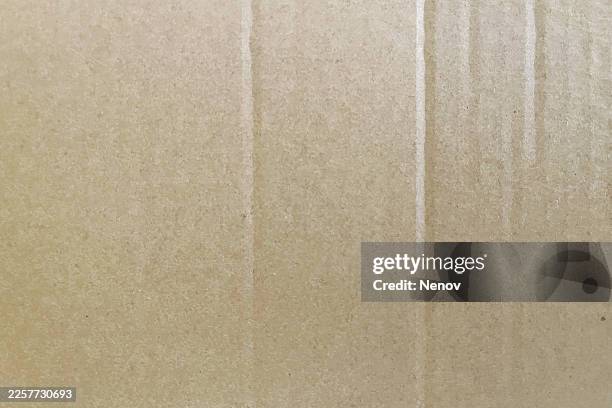 texture of recycled brown cardboard with vertical lines - paperboard stock pictures, royalty-free photos & images