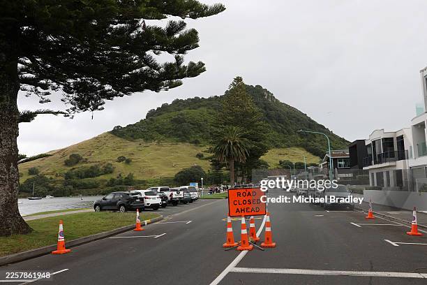 Emergency workers are seen at Mount Maunganui that is currently closed off due to a number of landslides on January 24, 2026 in Mount Maunganui, New...