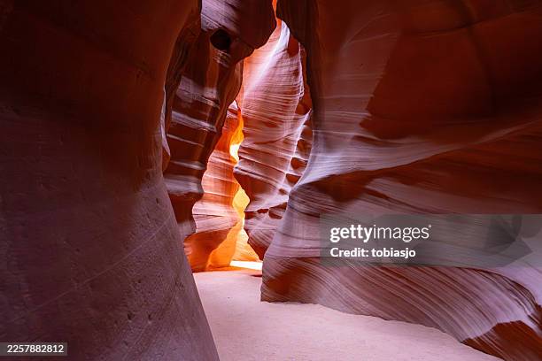 light and shadows inside antelope canyon walls - narrow stock pictures, royalty-free photos & images