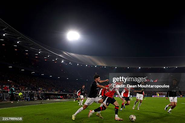 Anis Hadj Moussa of Feyenoord battles for the ball with Emir Karic of Graz during the UEFA Europa League 2025/26 League Phase MD7 match between...