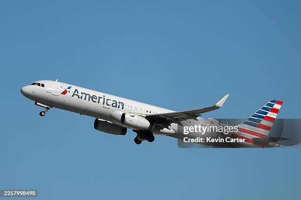 An American Airlines Airbus A321 airplane departs from Los Angeles International Airport en route New York on January 27, 2026 in Los Angeles,...