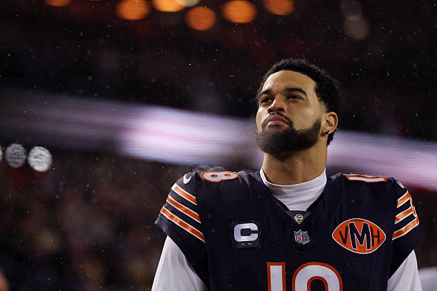 Caleb Williams of the Chicago Bears stands on the sideline prior to an NFL divisional playoff football game against the Los Angeles Rams at Soldier...