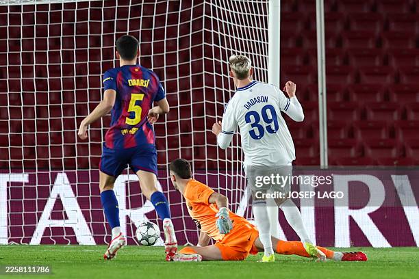 Copenhagen's Icelandic forward Viktor Dadason scores his team's first goal during the UEFA Champions League league phase day 8 football match between...