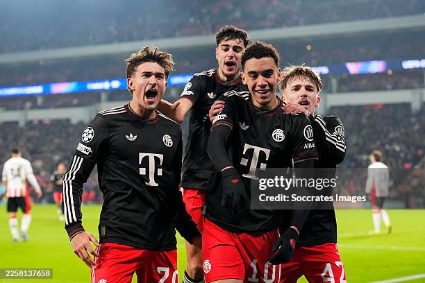 Jamal Musiala of Bayern Munchen celebrates scoring the first goal making it 0-1 with Tom Bischof of Bayern Munchen, Lennart Karl of Bayern Munchen,...