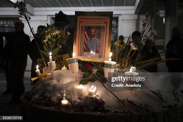 Anti-ICE protesters held a candlelight vigil for Alex Pretti, the 37-year-old ICU nurse who was shot and killed by a federal agent, outside of the...