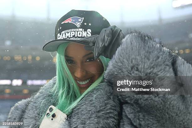 Artist Cardi B poses for a photo following the AFC Championship Playoff game against the Denver Broncos at Empower Field At Mile High on January 25,...