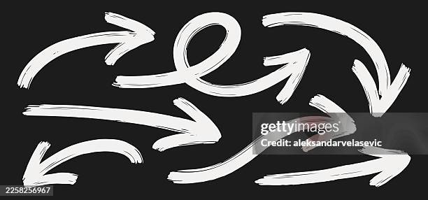 painted arrows - drawn arrow stock illustrations