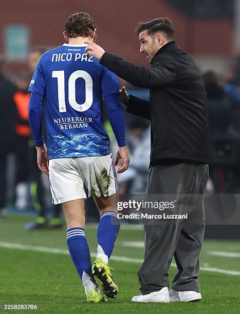 Como 1907 coach Cesc Fabregas issues instructions to his player Nico Paz of Como 1907 during the Serie A match between Como 1907 and Torino FC at...