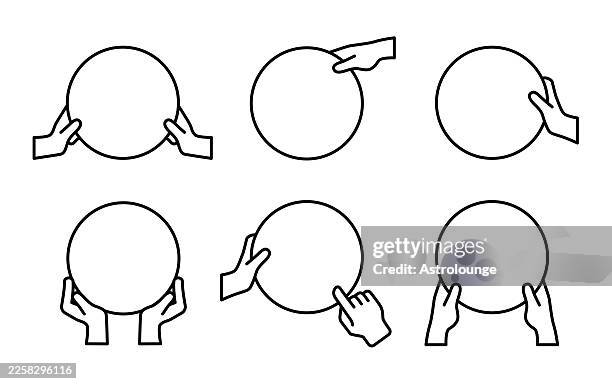 hands holding round shapes - holding hands stock illustrations