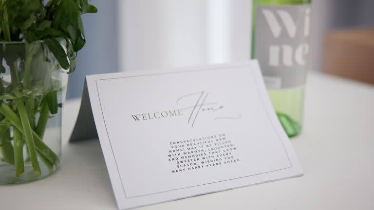 https://media.gettyimages.com/id/2258329312/video/new-home-real-estate-and-note-on-table-for-moving-to-dream-house-property-purchase-and.jpg?b=1&s=640x640&k=20&c=u3TRQko1PzGGdncPAxyO_gx3Gma37PfznfA17yQi-bk=