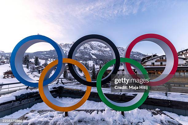 The Olympic Rings are set in front of surrounding mountains on January 26, 2026 in Cortina d'Ampezzo, Italy. Cortina will host Sliding, Curling and...