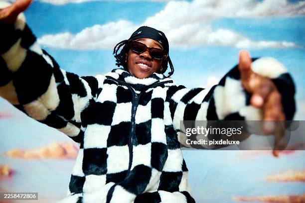 gen alpha child reaching welcoming viewer with open arms - bandana stockfoto's en -beelden