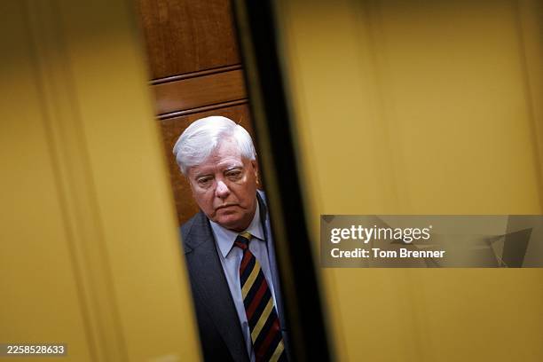 Senator Lindsey Graham is seen in an elevator ahead of a vote on Capitol Hill on January 30, 2026 in Washington, DC. The Senate continues to...