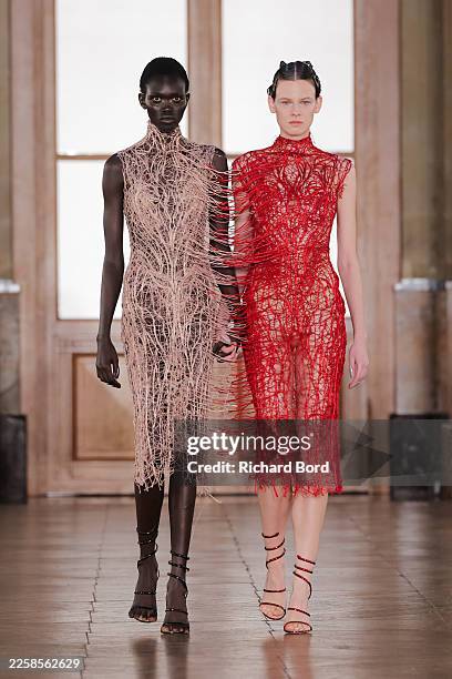 Models walk the runway during the Gaurav Gupta Haute Couture Week Spring/Summer 2026 show at Palais Brongnart as part of Paris Fashion Week on...