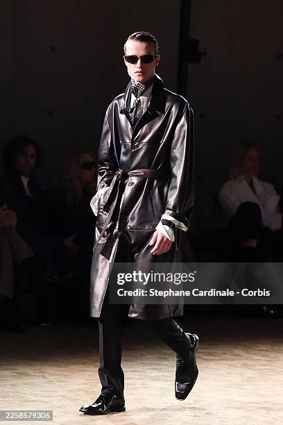 Model walks the runway during the Saint Laurent Menswear Fall/Winter 2026-2027 show as part of Paris Fashion Week on January 27, 2026 in Paris,...