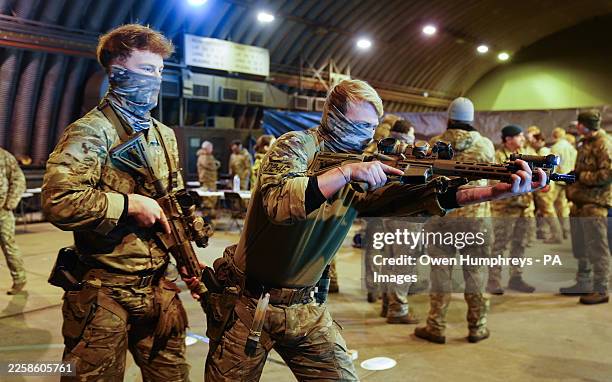 Members of the British military at RAF Leeming prepare for Exercise Hyperion Storm, a joint force validation exercise with the UK Special Operations...