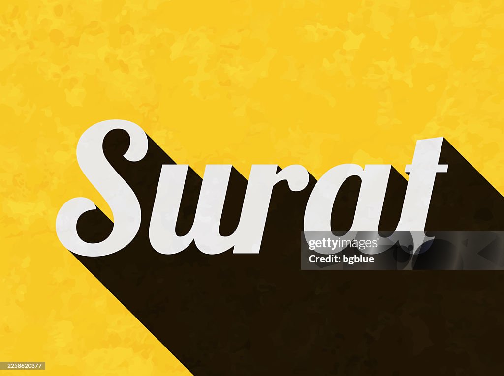 Surat - Text with long shadow on textured yellow background