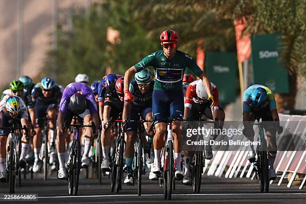 Jonathan Milan of Italy and Team Lidl - Trek - Green Leader Jersey celebrates at finish line as stage winner ahead of Daniel Skerl of Italy and Team...