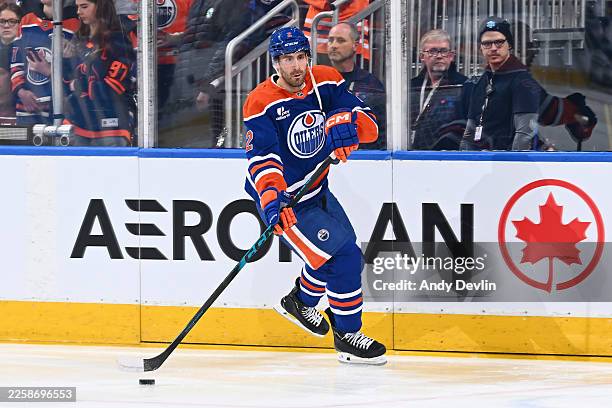 Evan Bouchard of the Edmonton Oilers participates in warmups prior to the game against the San Jose Sharks at Rogers Place on January 29 in Edmonton,...