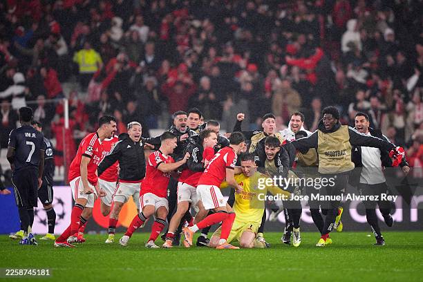 Anatoliy Trubin of Benfica celebrates scoring his team's fourth goal with teammates during the UEFA Champions League 2025/26 League Phase MD8 match...