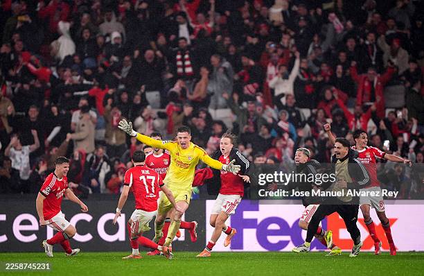 Anatoliy Trubin of Benfica celebrates scoring his team's fourth goal with teammates during the UEFA Champions League 2025/26 League Phase MD8 match...
