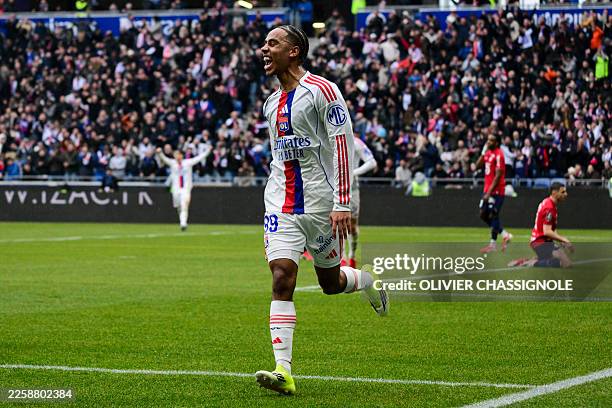 Lyon's Danish midfielder Noah Nartey celebrates scoring his team's first goal during the French L1 football match between Olympique Lyonnais and...