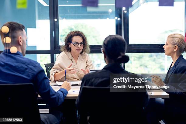 staff meetings enhance business operations by fostering clear communication, aligning team goals, and increasing productivity through collaborative problem-solving - position stock pictures, royalty-free photos & images