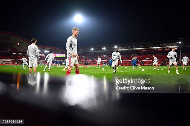 General view as Zach Abbott of Nottingham Forest warms up prior to the UEFA Europa League 2025/26 League Phase MD8 match between Nottingham Forest FC...