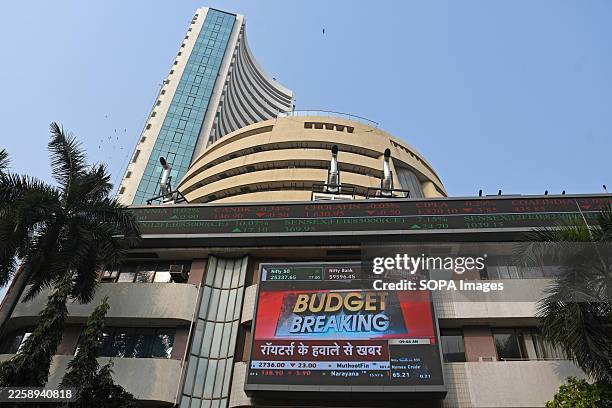 Budget Breaking' is seen flashing on a LED screen outside the Bombay Stock Exchange building in Mumbai. Nirmala Sitharaman, Minister of Finance and...