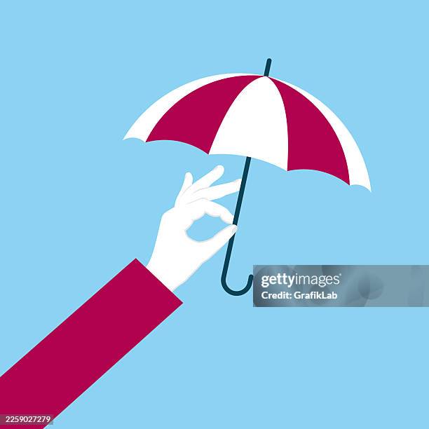 hand holding red and white striped umbrella representing security and insurance concept - holding red umbrella stock illustrations