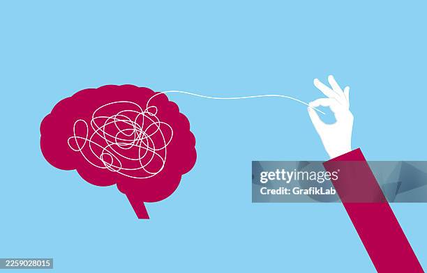 hand pulling a thread from the brain to clear mental confusion and clarify thoughts - brain fog stock illustrations