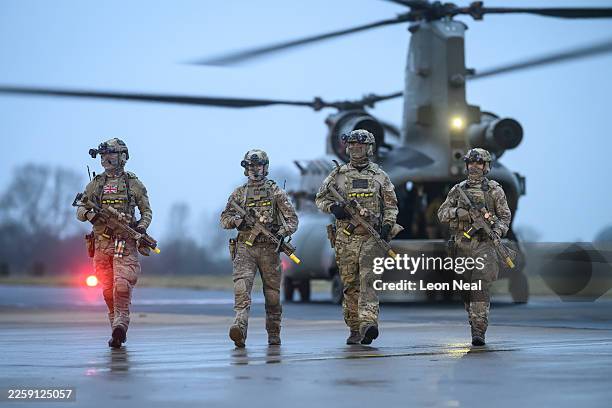Members of the Special Operations Forces practise their rapid deployment techniques with a Mk.6 CH47 Chinook helicopter ahead of the following day's...