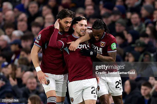 Jarrod Bowen of West Ham United celebrates scoring his team's first goal with teammates Konstantinos Mavropanos and Aaron Wan-Bissaka wduring the...