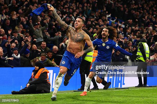 Enzo Fernandez of Chelsea celebrates scoring his side's third goal with team-mate Marc Cucurella during the Premier League match between Chelsea and...