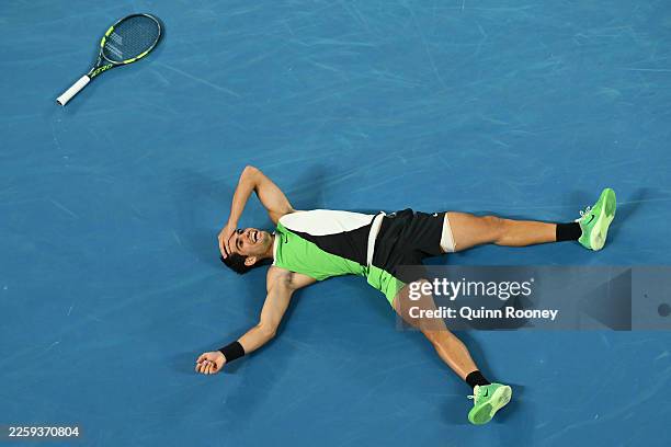 Carlos Alcaraz of Spain celebrates his victory in the Men's Singles Final against Novak Djokovic of Serbia during day 15 of the 2026 Australian Open...