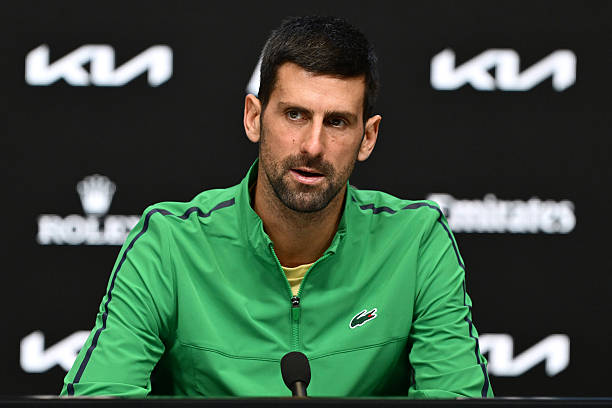 Novak Djokovic of Serbia speaks during a press conference following the Men's Singles Final against Carlos Alcaraz of Spain during day 15 of the 2026...