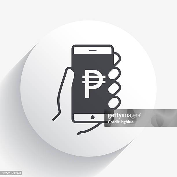 smartphone with peso sign. icon on circle button with long shadow - holding mobile phone stock illustrations