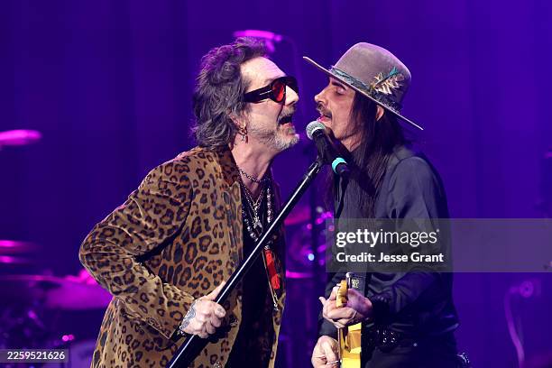 Chris Robinson and Nuno Bettencourt perform onstage during Steven Tyler's 7th Annual Jam for Janie GRAMMY Awards Viewing Party benefitting Janie's...
