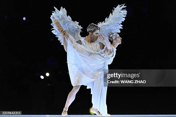 Italian ballet dancers Antonella Albano and Claudio Coviello perform during the opening ceremony of the Milano Cortina 2026 Winter Olympic Games at...