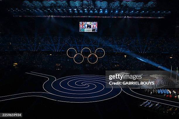 President of the Organising Committee for the 2026 Olympic and Paralympic Winter Games Giovanni Malago delivers his opening remarks during the...