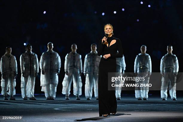 Peace Ambassador and South-African actress Charlize Theron delivers a speech during the opening ceremony of the Milano Cortina 2026 Winter Olympic...