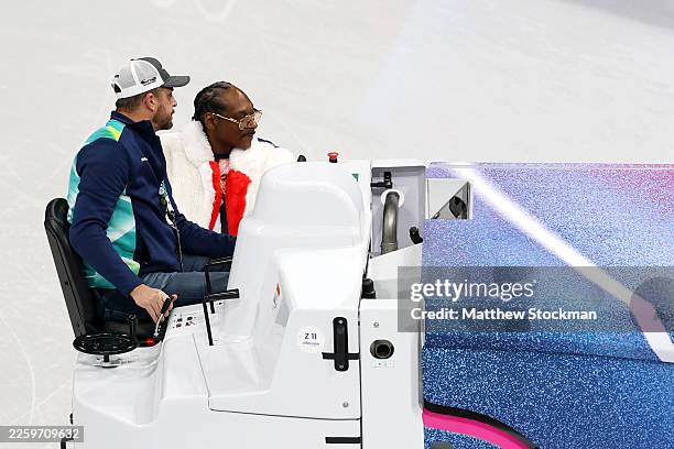 Snoop Dogg rides an ice resurfacing machine on day minus three of the Milano Cortina 2026 Winter Olympic games at Milano Ice Skating Arena on...